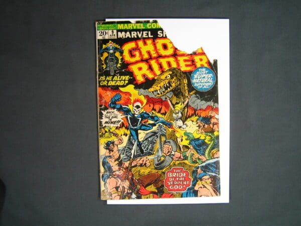 A Marvel Spotlight #9 comic book featuring Ghost Rider displayed on a flat surface.