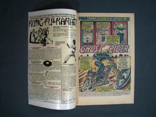 An open vintage comic book displaying pages with "kung fu" and Ghost Rider #10 stories.