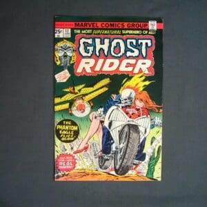 Sentence with product name: Ghost Rider #12 comic book on display, featuring the character riding a motorcycle with his signature fiery skull.