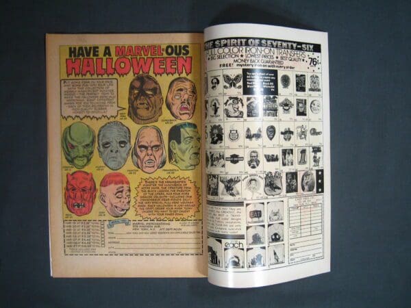 An open Ghost Rider #15 displaying an ad for halloween masks on the left page and various collectible items on the right page.